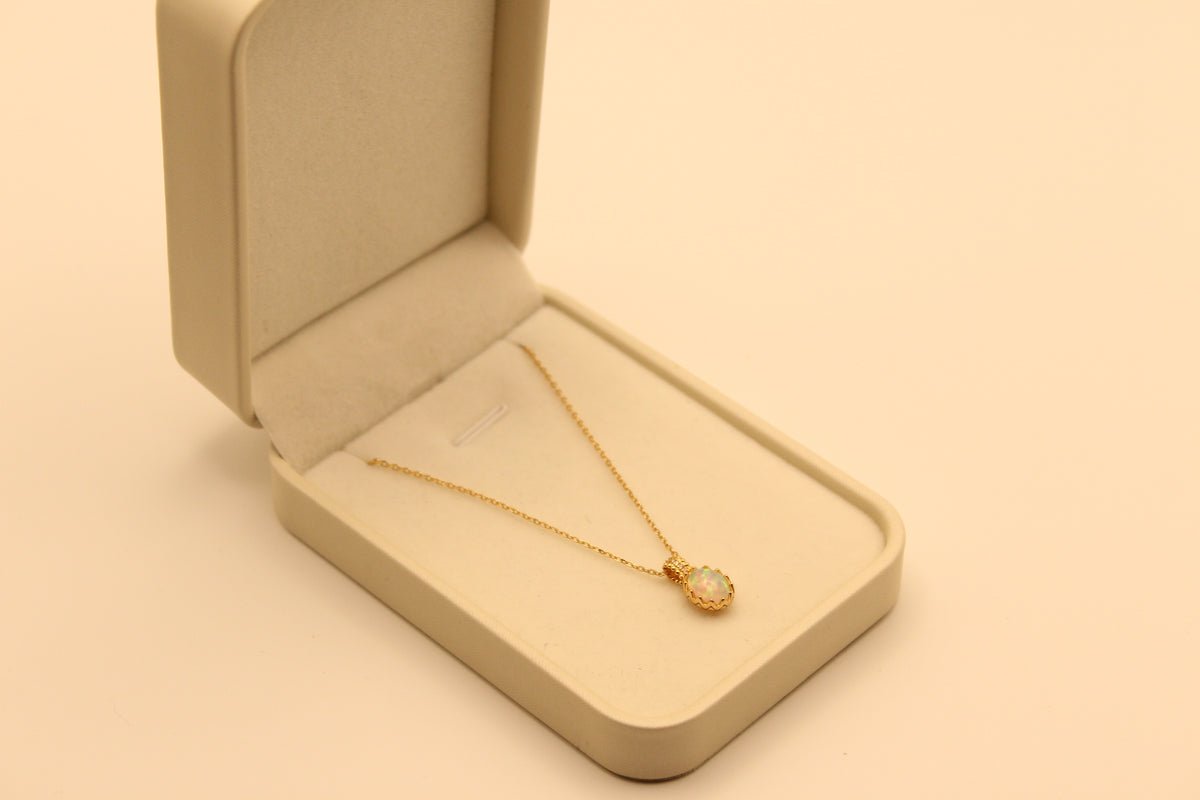 Elliptical Ethiopian Opal Pendant on Gold-Polished Silver Chain