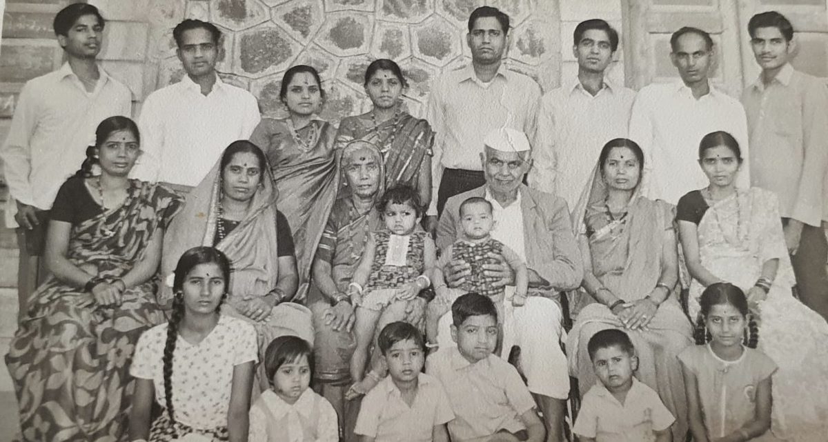 The family together in Maharashtra, gathered for a portrait in the 1960s